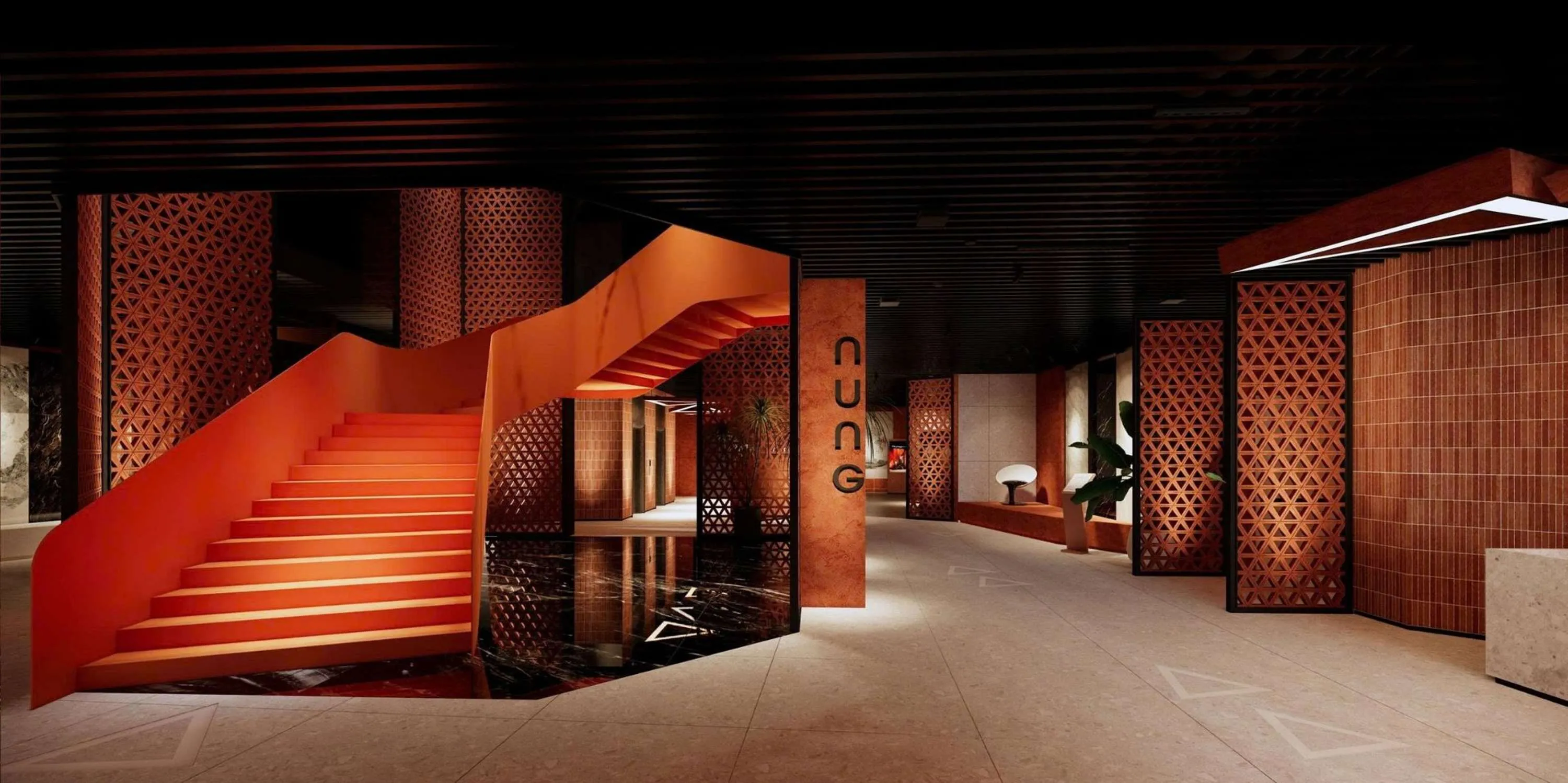 The Catalan Hub interior lobby features a sculptural staircase and a modern material design language.